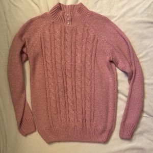 Pink cable knit turtleneck with pearl accents